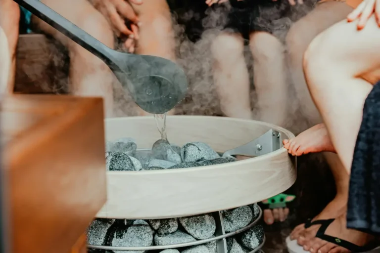 steam or löyly rising from a sauna heater